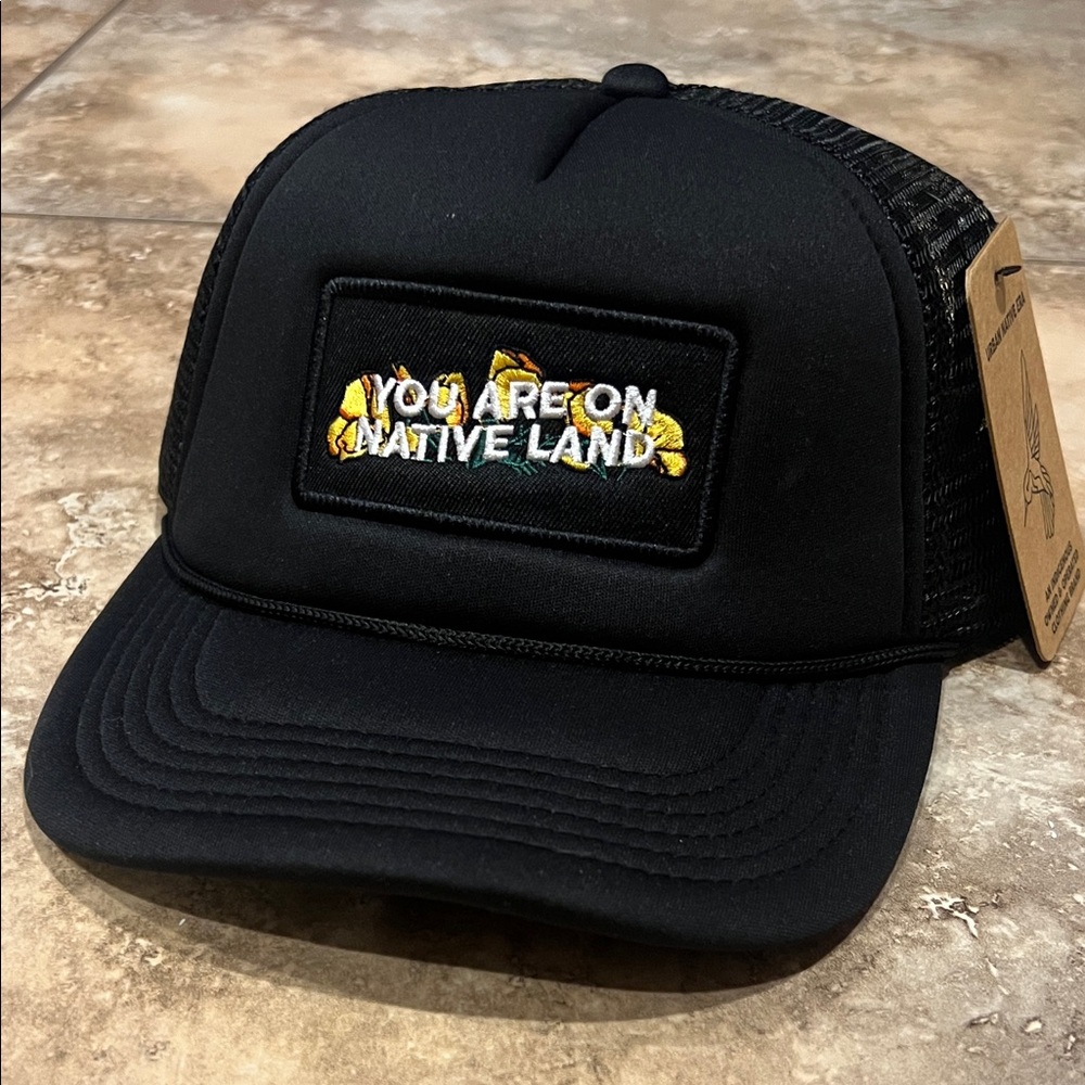 “You are on Native Land” Black Trucker Hat
